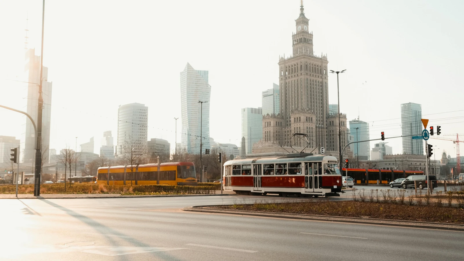 Scenic driving routes from Warsaw with historic tram passing through old town