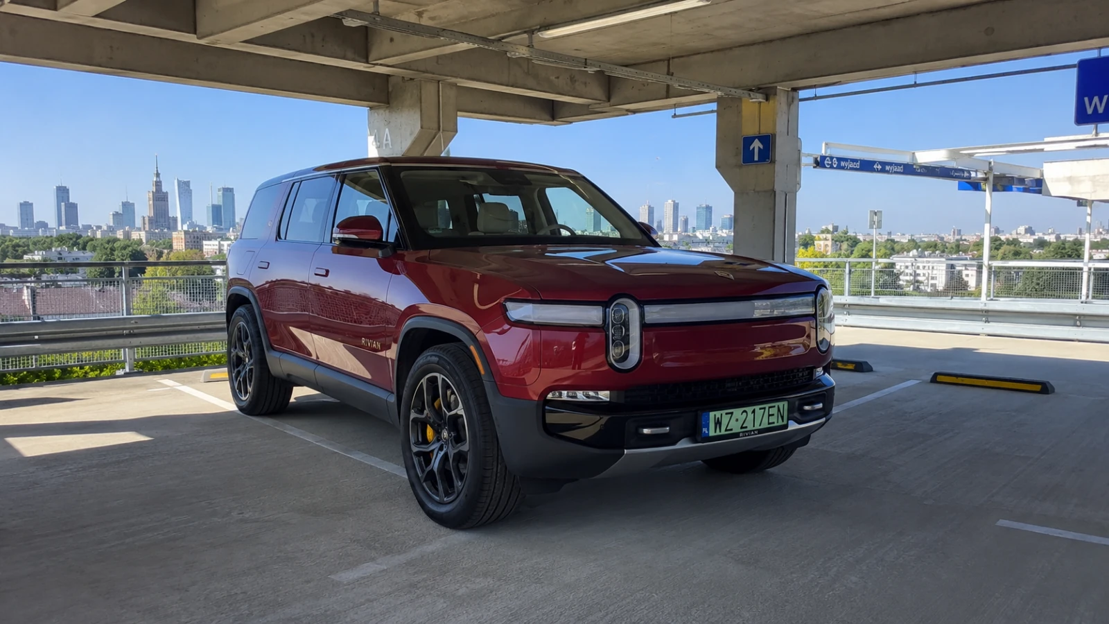 Rivian R1S electric SUV rental Warsaw for eco-conscious travelers